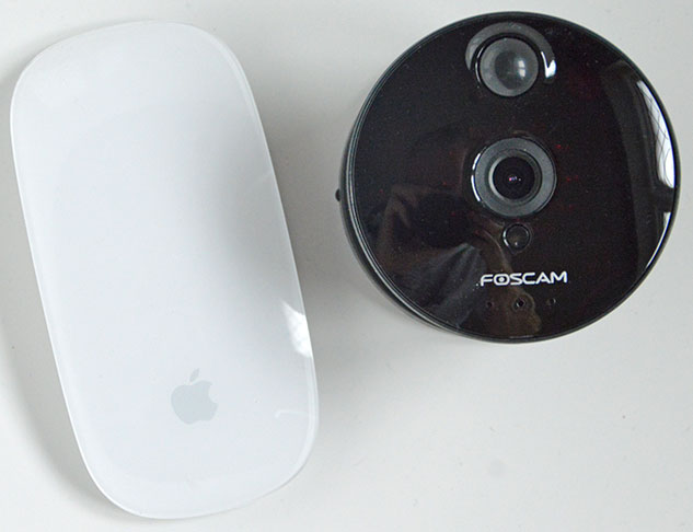 Foscam C1 with Magic Mouse for size comparison